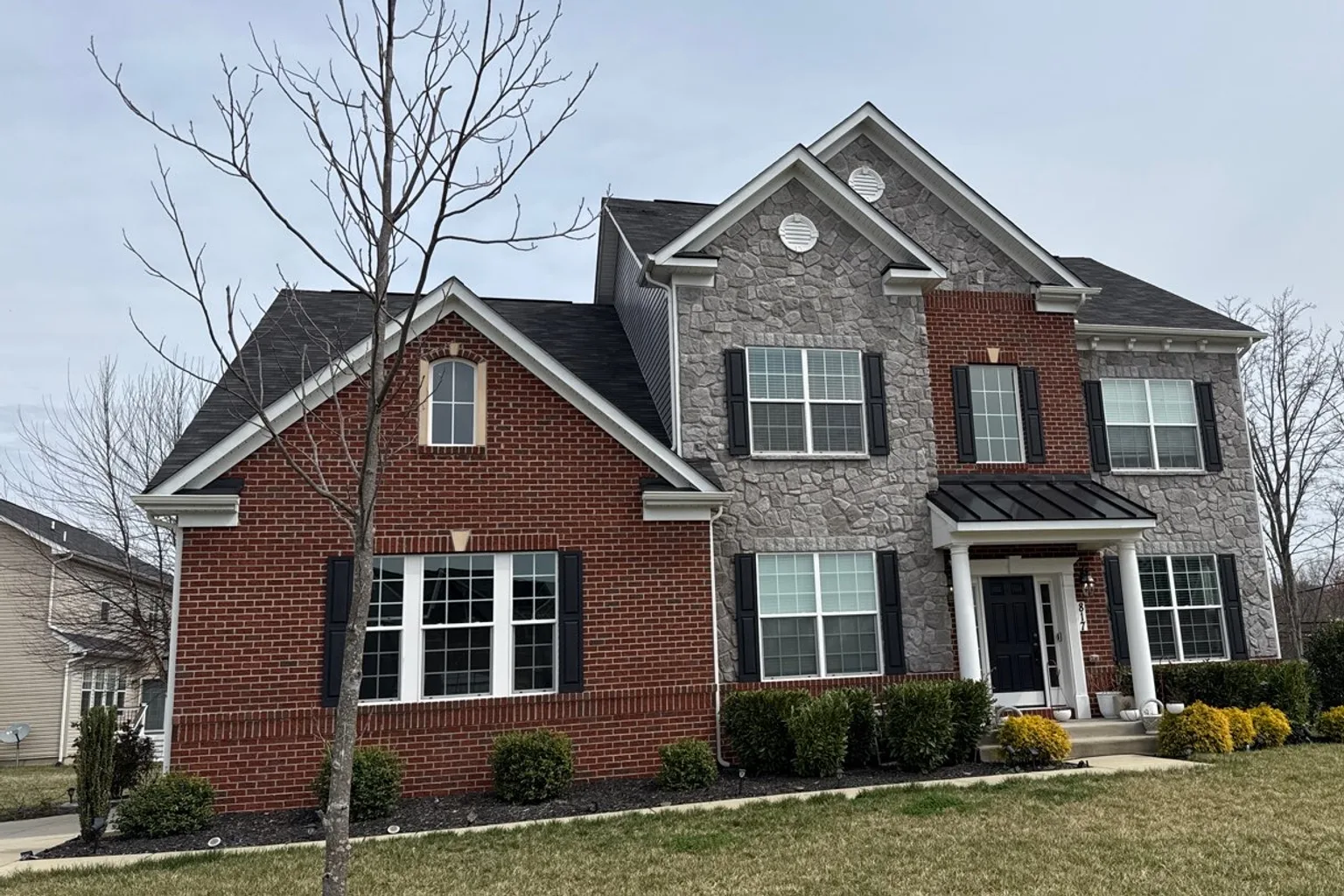 Completed brick Maryland home exterior from a CompanyCam project