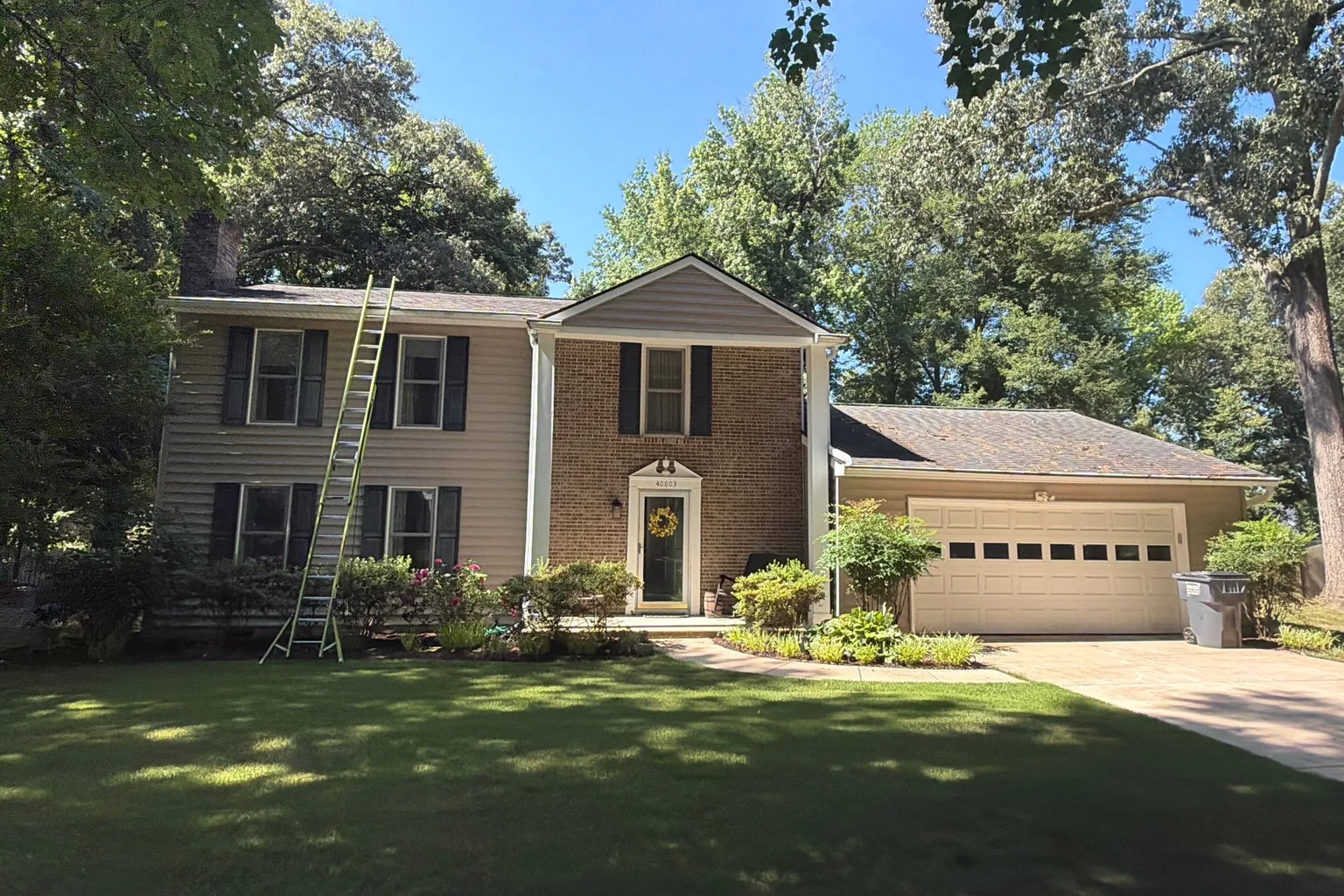 Completed exterior roofing and siding repair on a Maryland home